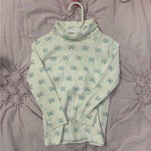 The Beaufort Bonnet Company White Turtleneck with Teal Bow Design